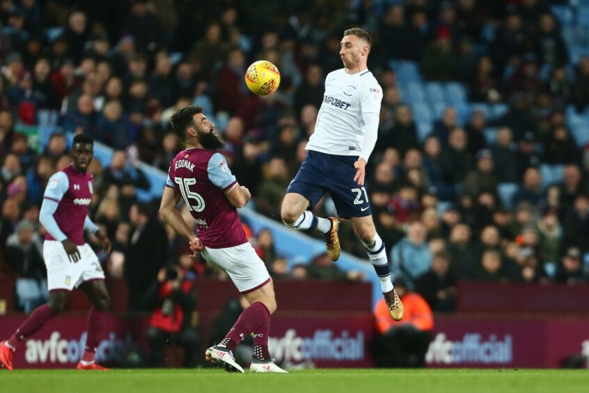 Louis Moult, right, in action against Aston Villa for Preston North End