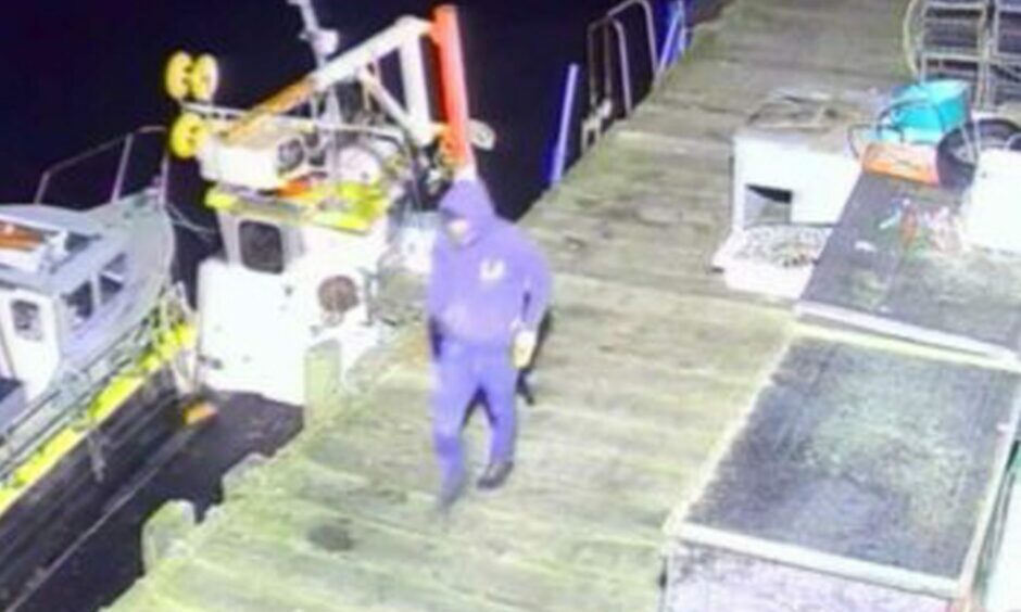 CCTV showing a hooded person vandalising a fishing boat in Methil