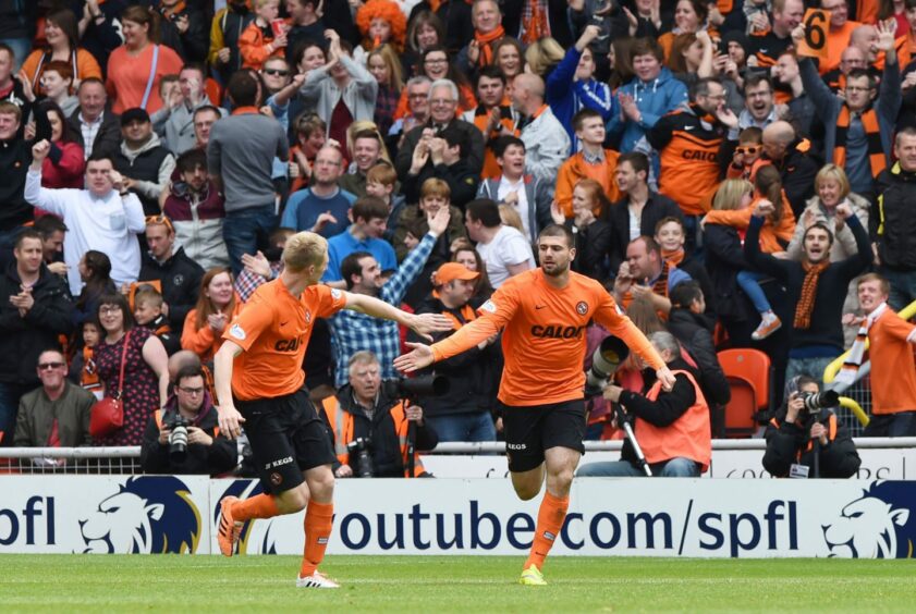 Nadir Ciftci celebrates a strike against Dundee for Dundee United