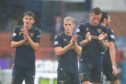 Dundee players applaud fans at Dens Park after the 1-1 draw with Motherwell. Image: David Young/Shutterstock