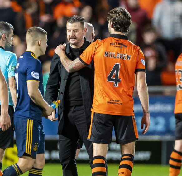 Former Dundee United manager Tam Courts and Charlie Mulgrew 