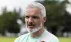 Dundee United manager Jim Goodwin speaks to the media at St Andrews