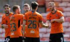 Dundeee United players celebrate a goal against Peterhead at Tannadice, Dundee