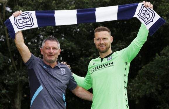 Tony Docherty with his new signing Trevor Carson. Image: SNS.