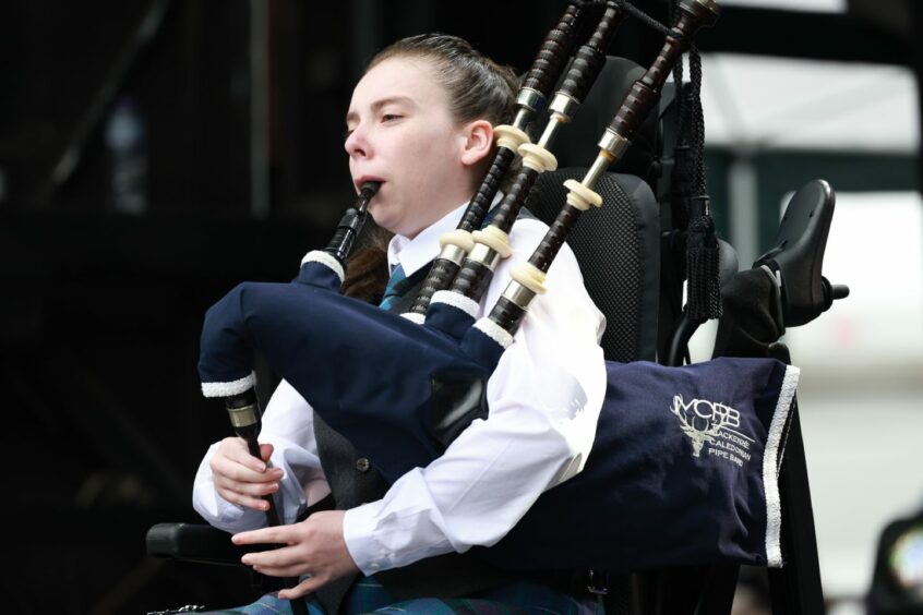 Katie Robertson - AKA the Wheeled Piper - playing at the launch of the UCI Cycling World Championships in Glasgow