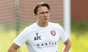 Dick Campbell sends Scott Allan off with Arbroath’s best wishes as he completes Larne loan move