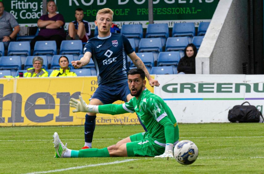 Kyle Turner shoots for goal to make it 1-0 for Ross County against St Johnstone earlier this season. Image: SNS.