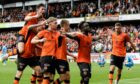 Dundee United celebrate their late leveller against Dunfermline. Image: SNS
