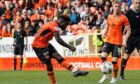 Mathew Cudjoe sweeps home a leveller for Dundee United against Dunfermline