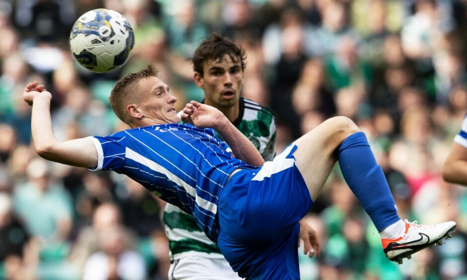 St Johnstone midfielder Matt Smith in action against Celtic.