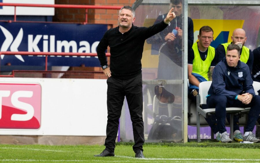 Tony Docherty watches on as Dundee beat Hearts. Image: SNS