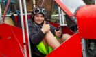 Kai McDermott,10, takes a seat in the centre's Red Baron replica. Image: Paul Reid