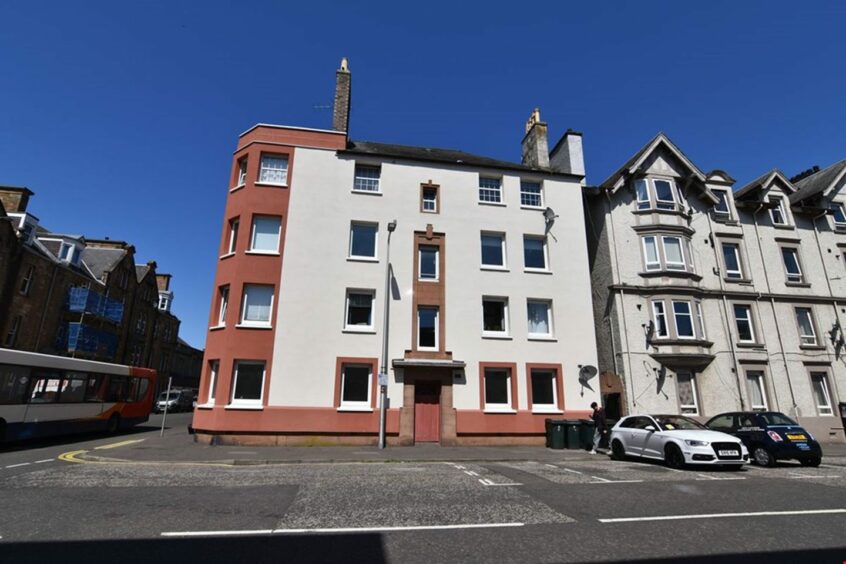 This 3 bedroom flat is in a modern block in Perth.