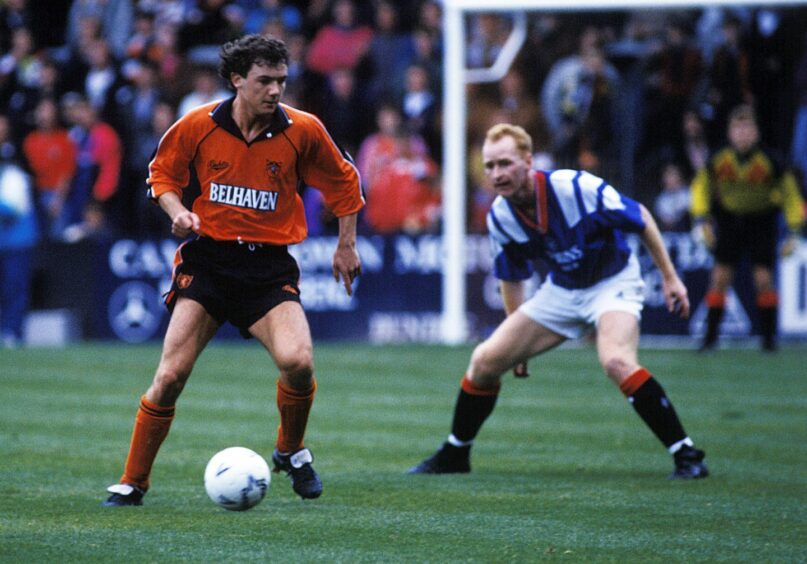 A youthful Dundee United striker, Christian Dailly, scampers away from Rangers' John Brown