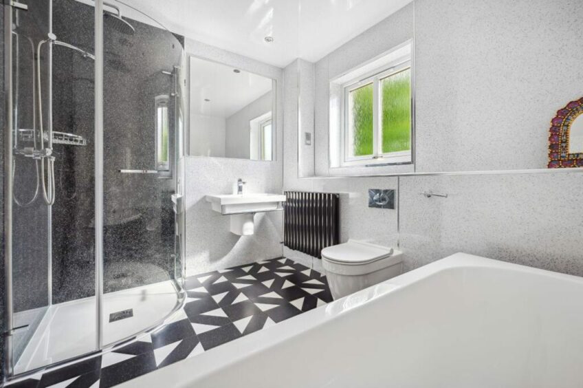 The spacious family bathroom at the Colourful Perthshire house. 