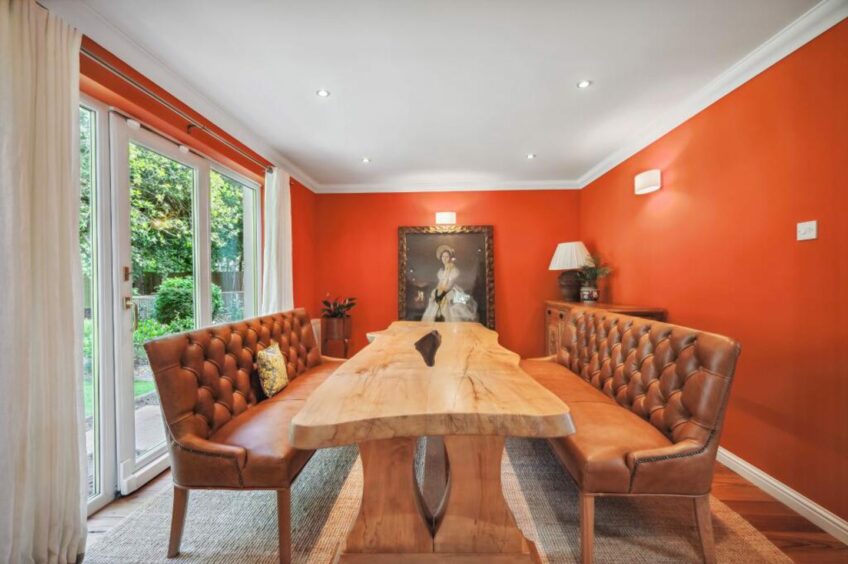 Large dining table at Perthshire home with annexe 