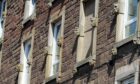 This image, taken by author Brian King, shows the gargoyles which survived in North Ellen Street. Image: Supplied.