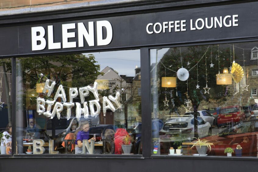 Birthday balloons in the window at Blend Coffee Lounge in Perth