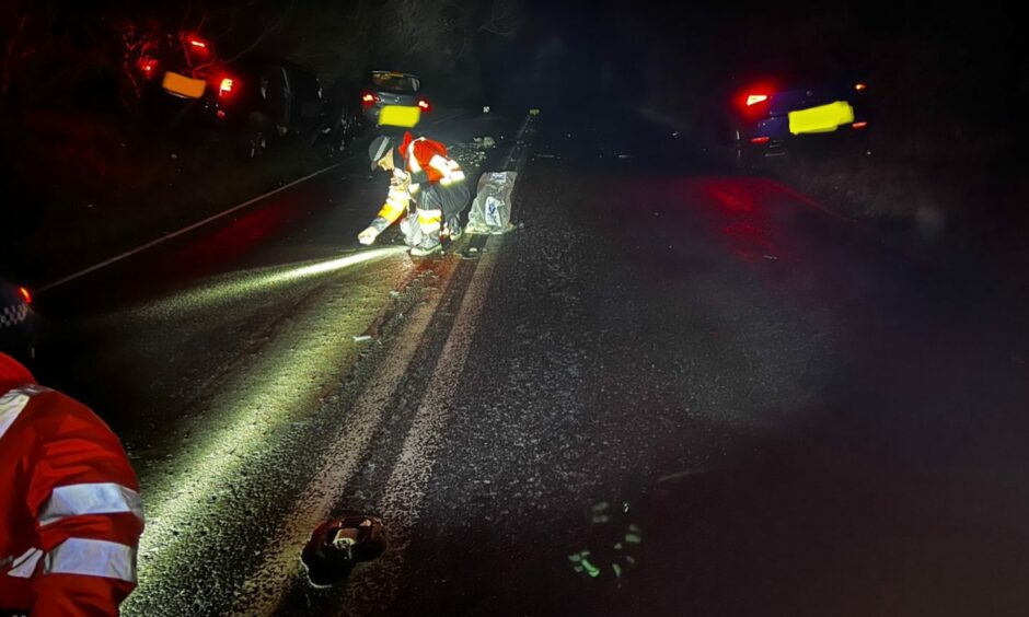 Police work at the crash scene in Fife.