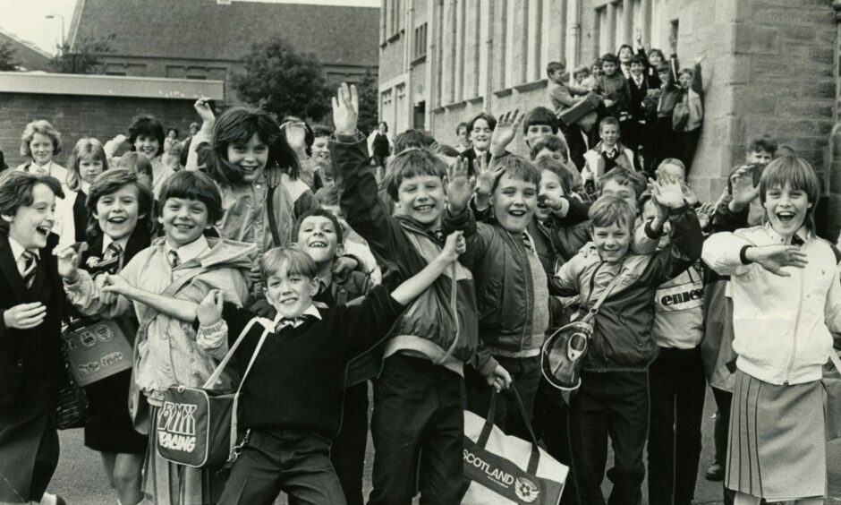 The first day back at school was excitement personified for these kids at Glebelands primary in August 1986. Image: DC Thomson.