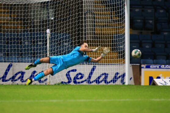 Reece Beveridge's penalty save earned East Fife their place in the next round of the SPFL Trust Trophy.
Image: David Young.