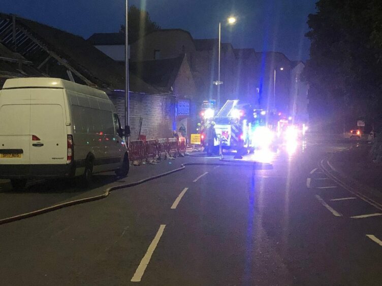 Fire crews tackle blaze at former Dens Road Market building on Dens Road Dundee.