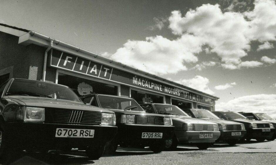 Macalpine Motors was situated on Macalpine Road and offered new and used cars alongside garage services and petrol pumps. Image:  DC Thomson.