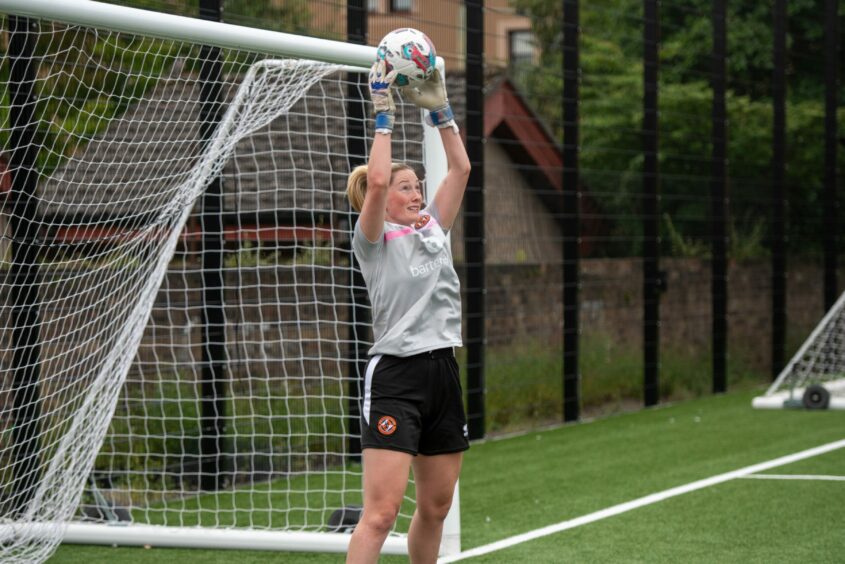 Dundee United goalkeeper Megan Sidey saves a drive