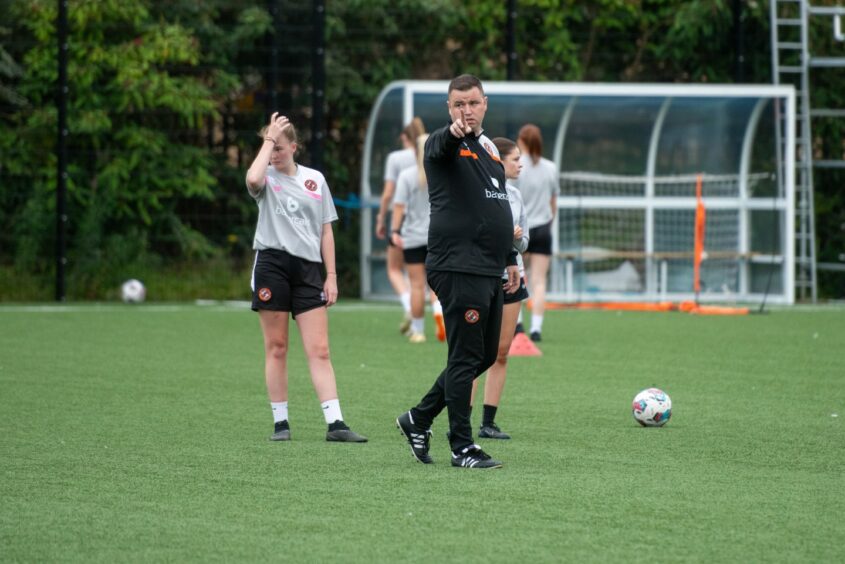 Dundee United women's boss Graeme Hart dishes out the orders