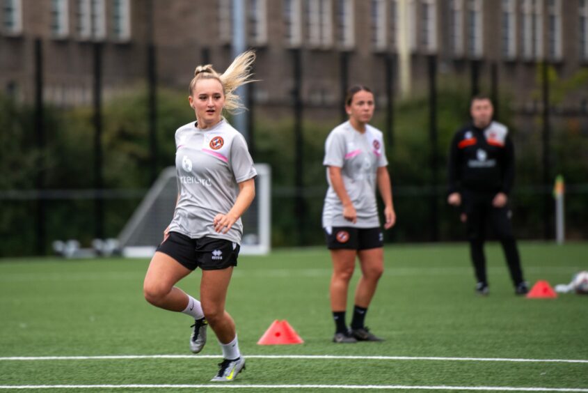 Georgie Robb launches a Dundee United attack. 