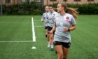 Nicola Jamieson leads the way during a Dundee United running drill