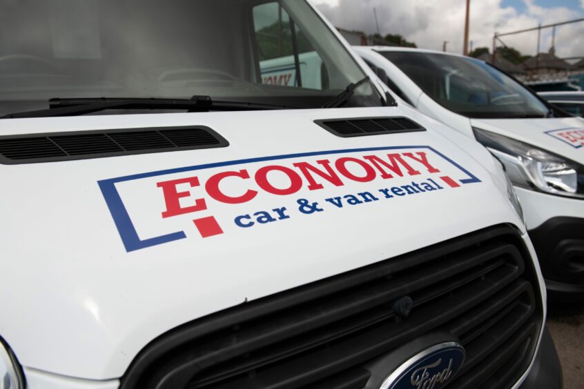 An Economy car and van rental vehicle. 