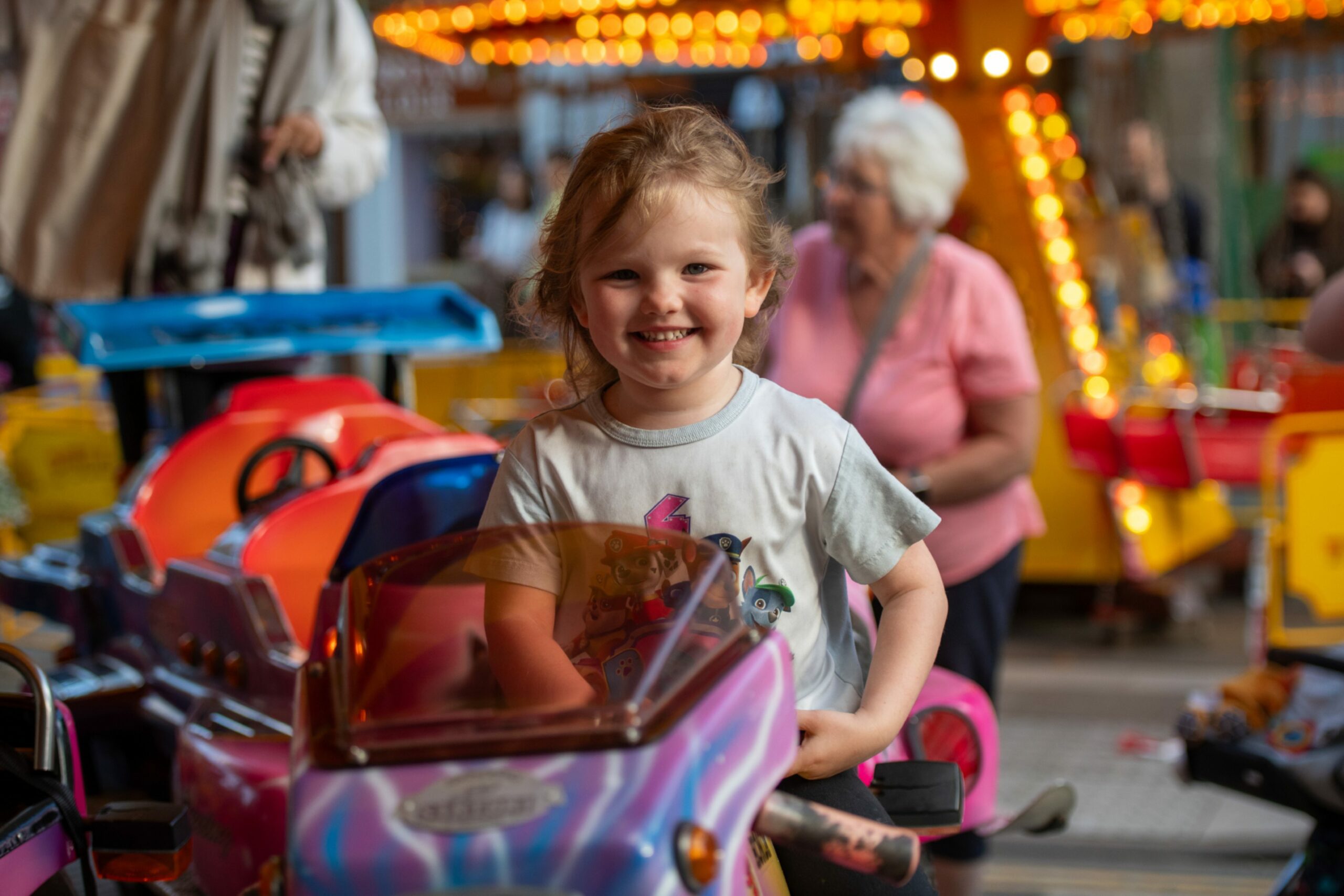 Liana Lee enjoyed her turn on one of the rides, Lammas Market, Market Street, St Andrews.