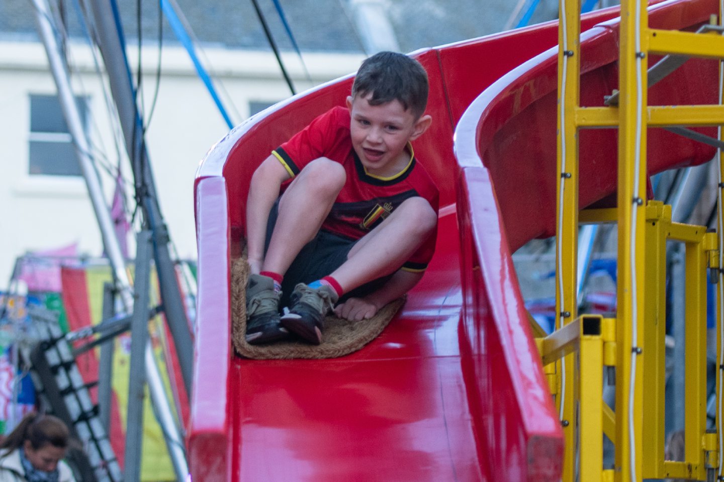 Daniel Webster on the helter skelter at Lammas Market, Market Street, St Andrews.