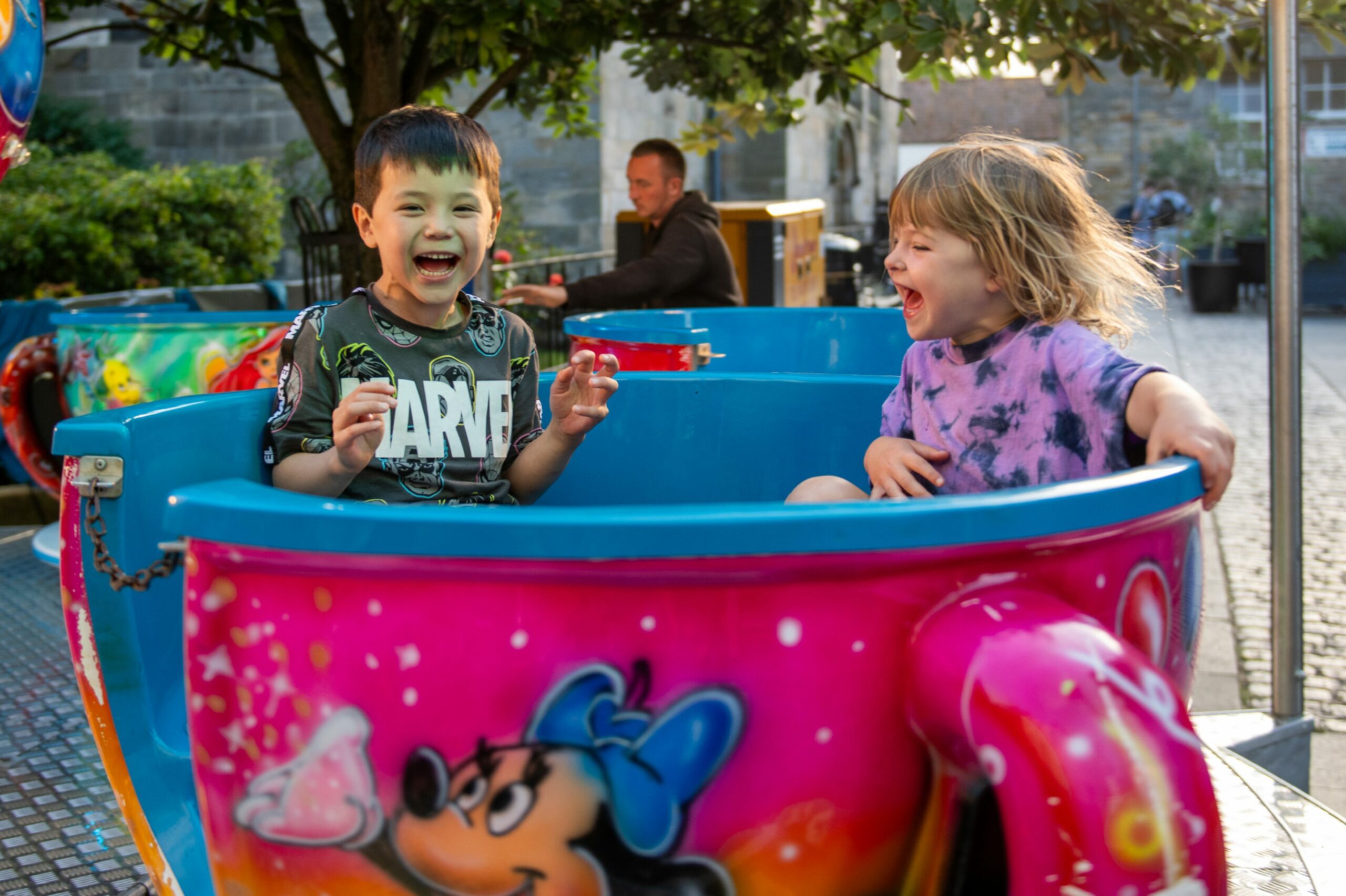 Emerson and Sophia enjoy one of the rides at the Lammas Market, Market Street, St Andrews.