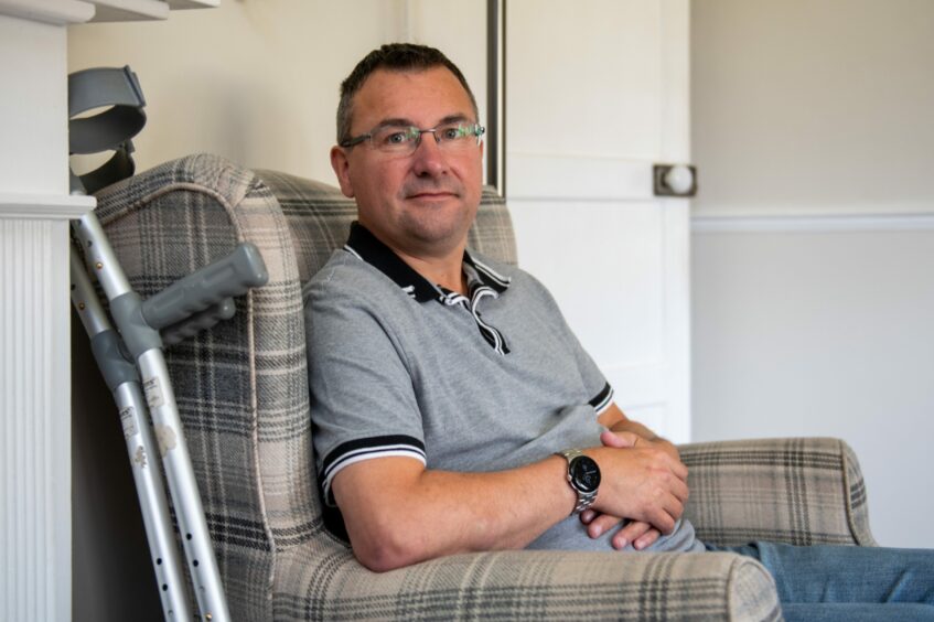 Disabled Dundee United Fan Mark Forrester after the football parking rules have changed 