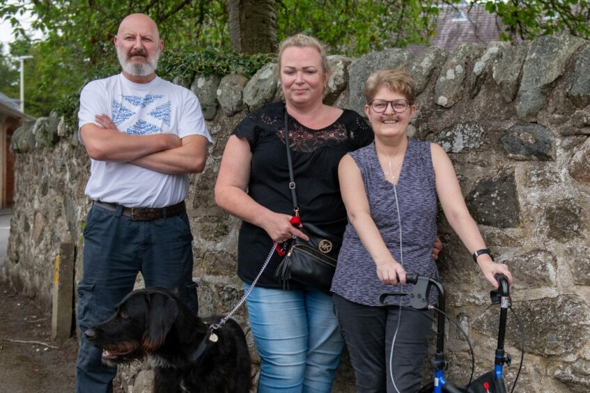 rother Roy Lunn, friend Sarah Fergusson (with Bailey, the dog) and Nicola Lunn.
