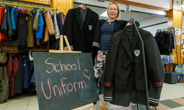 Elizabeth Philip of Crieff Connexions with the second hand clothing which reduces excessive cost and waste. Image: Kenny Smith/DC Thomson
