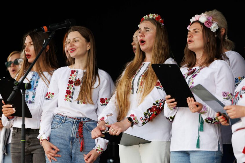 The Dundee Ukranian Choir on stage.