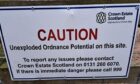 A sign warning of unexploded ordnance at the former Montrose RAF base.