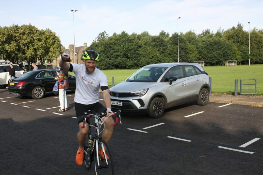 Kris Dear during the Angus glens cycle challenge for Hamish Dear's Warm Hugs