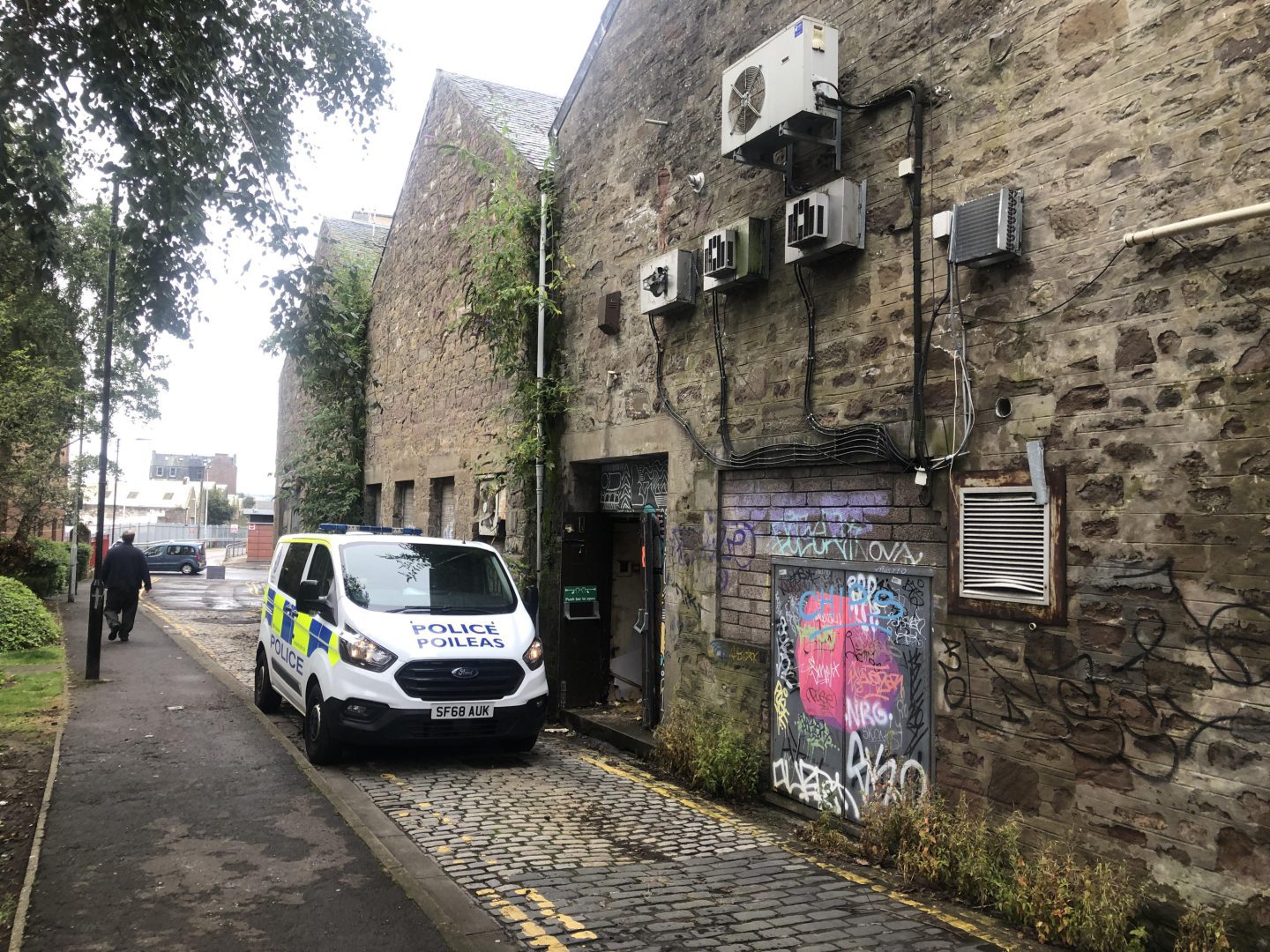 A police vehicle at the back of the Lyrics building on Wednesday.