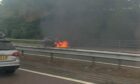The M90 northbound was closed due to a car fire.