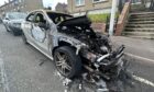 The damaged car on Dallas Drive in Kirkcaldy.