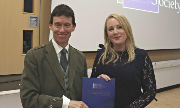 Rory Stewart presents RSGS Fellowship to Laura Cook. Image: RSGS