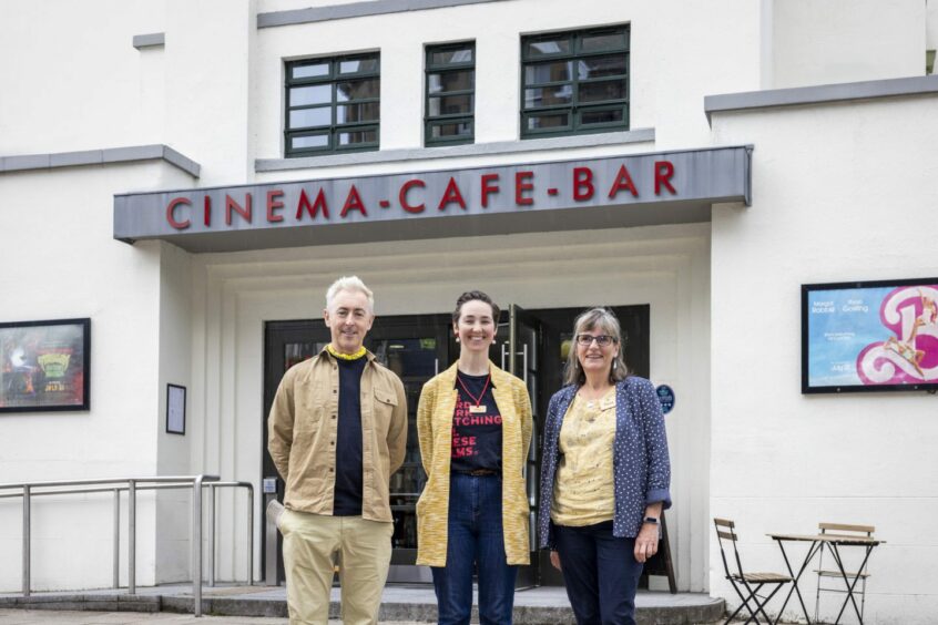Alan Cumming outside The Birks Cinema in Aberfeldy with cinema manager Patty Havey (middle) and programme and community development manager Fiona MacEwan