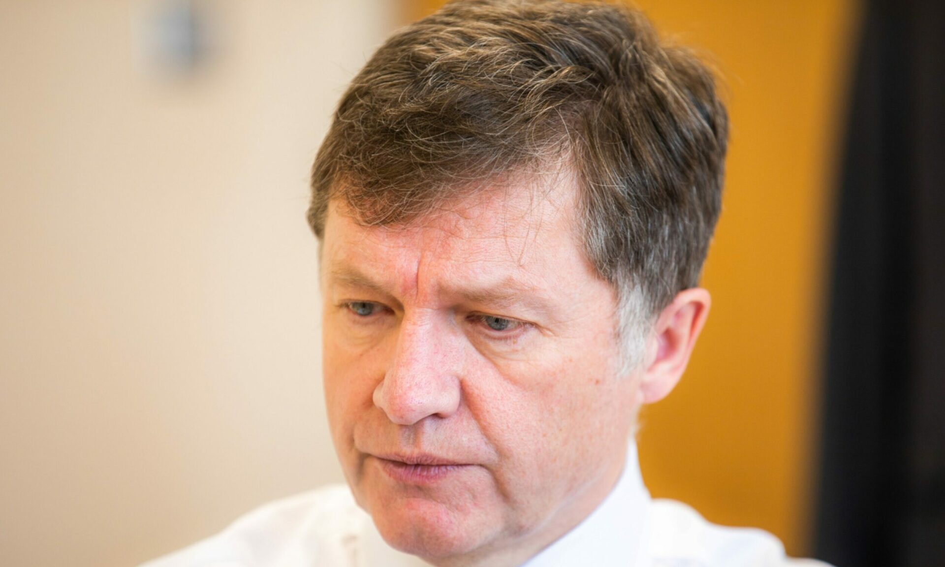 Former NHS Tayside chief returns to work weeks after retirement