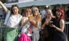 Five women pose for a picture outside the cider tent at the Sausage and Cider Festival at Dundee's Slessor Gardens.