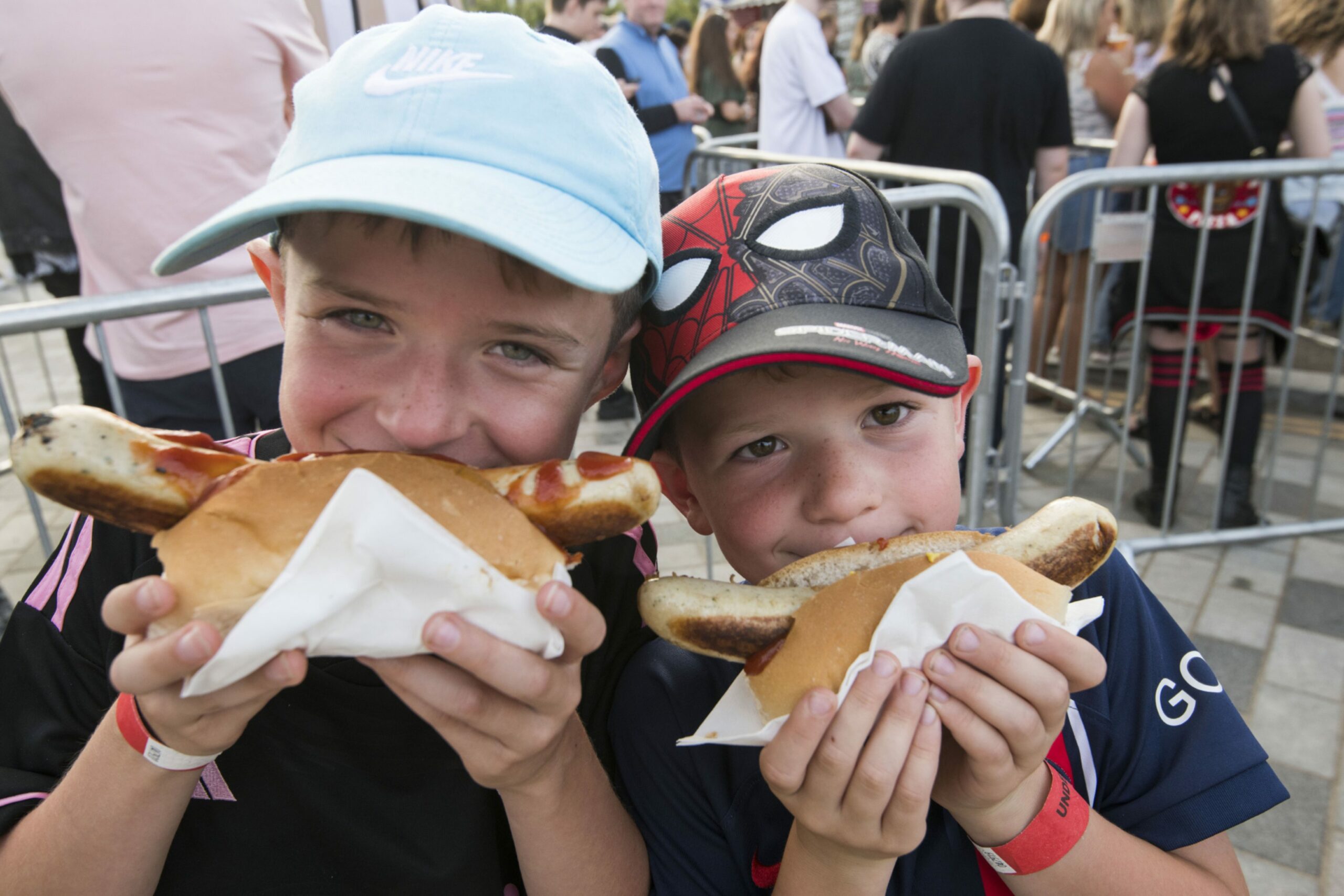 Hot Dog smiles from two youngsters at the Sausage and Cider Festival took place on Friday Night at Dundee's Slessor Gardens.