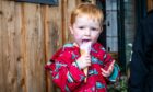 Stanley Grewer, 3, eating an ice cream at the Barrie Box summer fair.